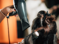 expert stylist styling hair